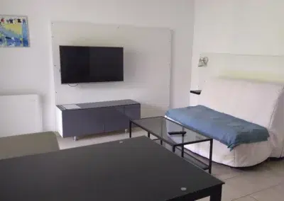 Salon TV logement L'Océanide